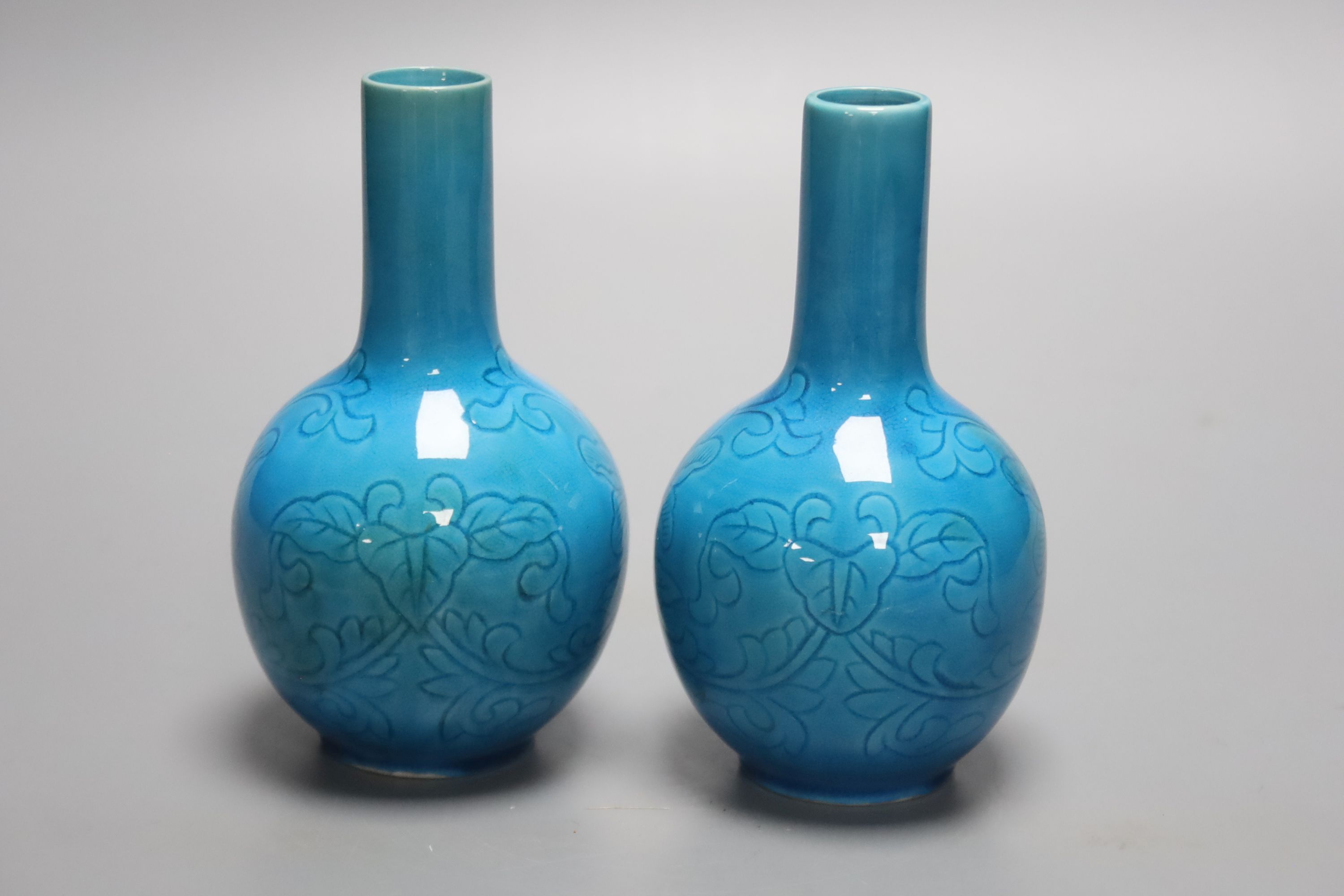 A pair of Chinese turquoise sgraffito bottle vases, early 20th century, height 12.5cm